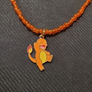 Orange Beaded Necklace with Charmander Pendant